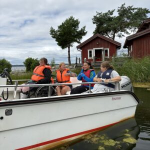 Deltagare i den anpassade motorbåten